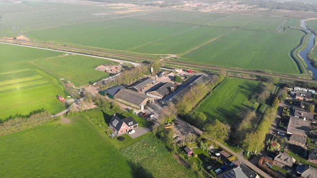 Aerial view small beautiful village in Holland. Flying over the roofs of houses and streets of a small village in Holland.