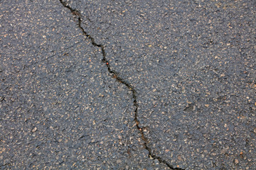 cracks on the asphalt road