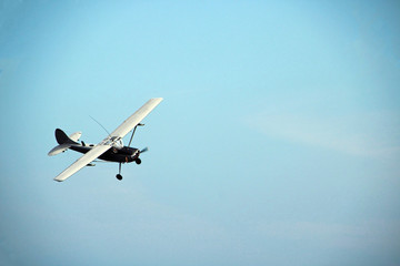 Fighter plane flying through the sky.