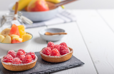 Fresh homemade cake with raspberries.
