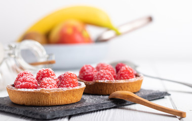 Fresh homemade cake with raspberries.