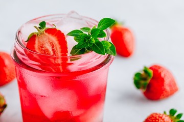 Strawberry Basil Iced Tea or lemonade in a jars