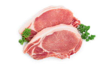 sliced raw pork meat with parsley isolated on white background. Top view. Flat lay