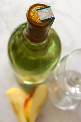 Fototapeta premium bottle of whitewine on table