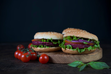 Vegetarian burgers with beetroot cutlet and vegetables