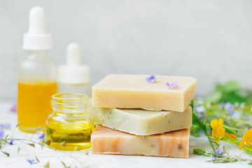 Natural handmade soap bars with organic medicinal plants and flowers.Homemade beauty products with natural essential oils from plants and flowers