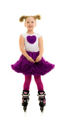Little girl on roller skates.
