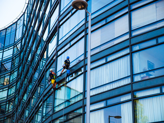 Fototapeta premium Window Washers on a residential building, London, UK