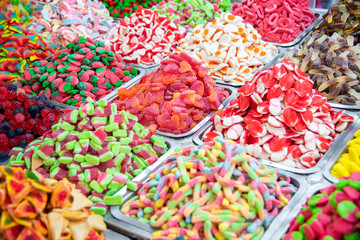 Confectionery shop at Carmel market in Tel Aviv, Israel. Colorful gumdrops and wine gum sweets. Market stall full of candys.