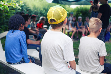 Meeting of children in the summer camp in a sunny day