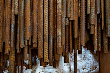 Top view stack of straight old rusty high yield stress deformed reinforcement steel or iron bars....