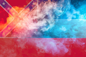 The national flag of the US state Mississippi in against a gray smoke on the day of independence in different colors of blue red and yellow. Political and religious disputes, customs and delivery.