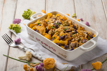 oven mixed color cauliflower with pine nuts and cheese