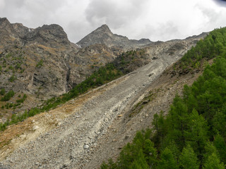 Mountain landscape with dirty glacier, Alps