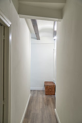 Apartment corridor with white walls