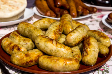 Delicious grilled sausages. Background of sausages.