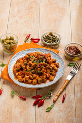 tempeh with tomatoes capers and green olives