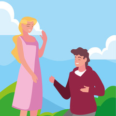 man kneeling with woman holding hand