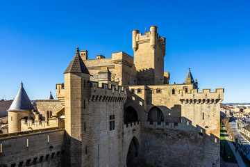Fototapeta na wymiar Imposing walls and towers part of the Palacio Reale de Olite in Navarre region, Spain