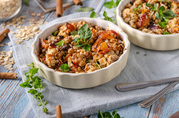 Baked oatmeal with fruit and maple syrup