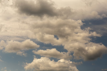Clouds on a Sunny summer day,light breaking through the clouds.