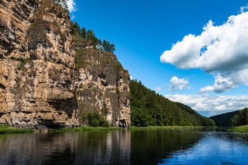 Fototapeta na wymiar mountain river landscape flows on a summer day