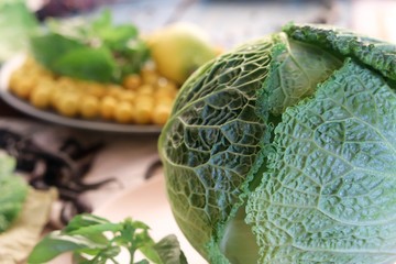 Obraz premium Fresh vegetables, fruits and spices on a wooden table, cooking healthy food, autumn, summer season