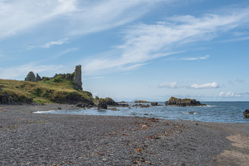 Fototapeta na wymiar Dunure castle Ruins and Rugged Coast Line in Scotland Outlander Filming Location With its Rugged Sea Defences.