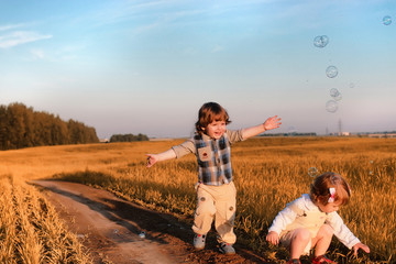 Children outdoors in a field