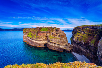 Fototapeta premium View of the cliff and the rock at Bell Island Light House, Newfoundland, Canada