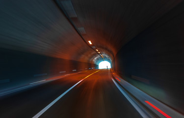 Fototapeta na wymiar Tunnel on the highway. Motion