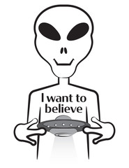 An alien with a t-shirt that says 
