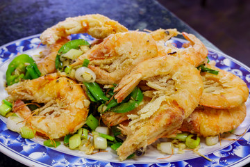 Close up shot of a dish of deep fried shrimp