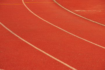Sport. A red treadmill at the stadium. Copy space