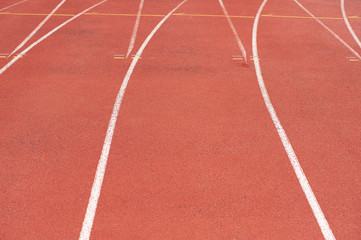 Sport. A red treadmill at the stadium. Copy space