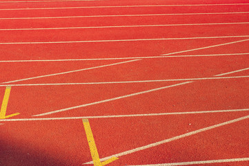 Sport. A red treadmill at the stadium. Copy space