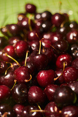 Big collection of red cherries. Background of ripe cherries.