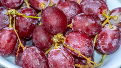 fresh red grape on white background
