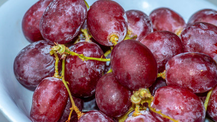 fresh red grape on white background