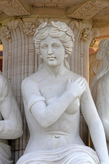 Fototapeta na wymiar ancient Greek lady was sculptured in the park