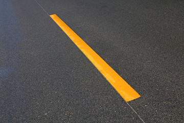 yellow line on the asphalt road