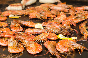 Fresh hot grilled shrimp on the grill 