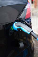 Modern electric car is charging
