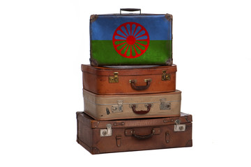 Gipsy, Roman travel concept. Group of vintage suitcases isolated on white background.