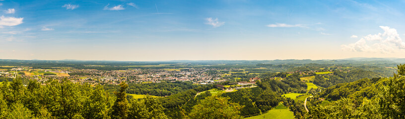 Fototapeta na wymiar Panorama of Leibnitz in south styria in Austria. Landscape of Leibnitz area from Kogelberg.