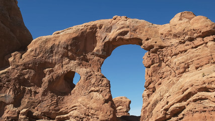 low angle shot of turret arch in utah