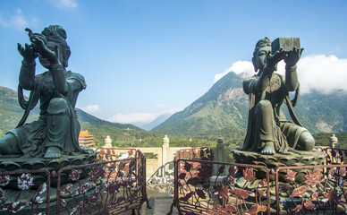  Beautiful day at the Big Buddha in Lantau Island , Hong Kong .  Its an amazing short escape from the crowded city with this breathtaking nature around.