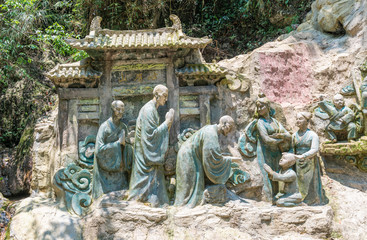 Cliff stone carvings on the half-mountain side of Emei Mountain, Sichuan Province, China