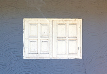 Plaster walls, old wooden windows