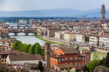 Fototapeta na wymiar View of Ponte Vecchio and the beautiful city of Florence from Michelangelo Square